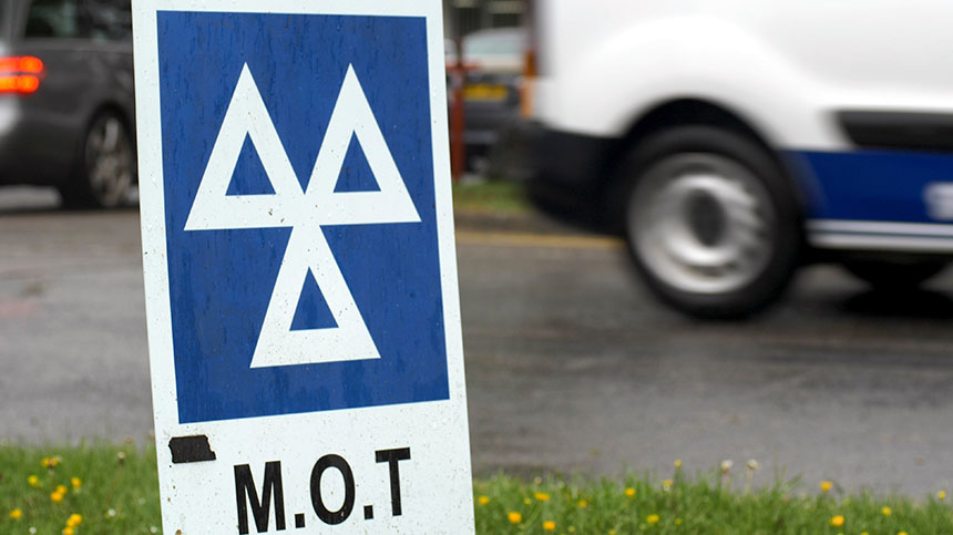 Blue MOT service sign